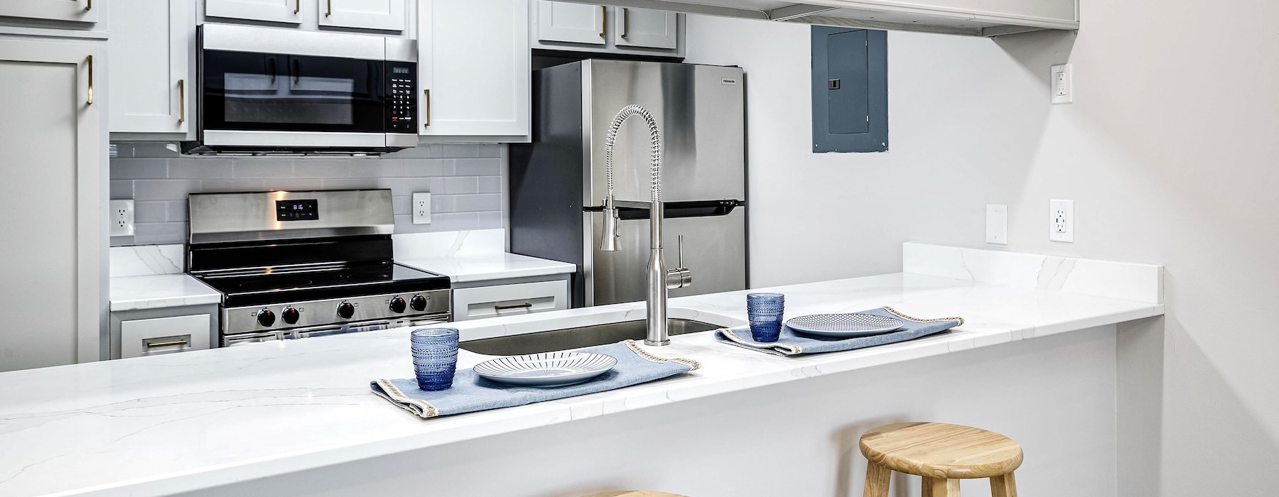 kitchen serving counter with stools